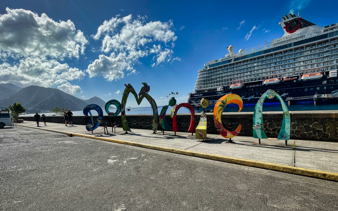 Dominica sign on the Roseau Cruise Ship Berth in front of Mein Schiff 4